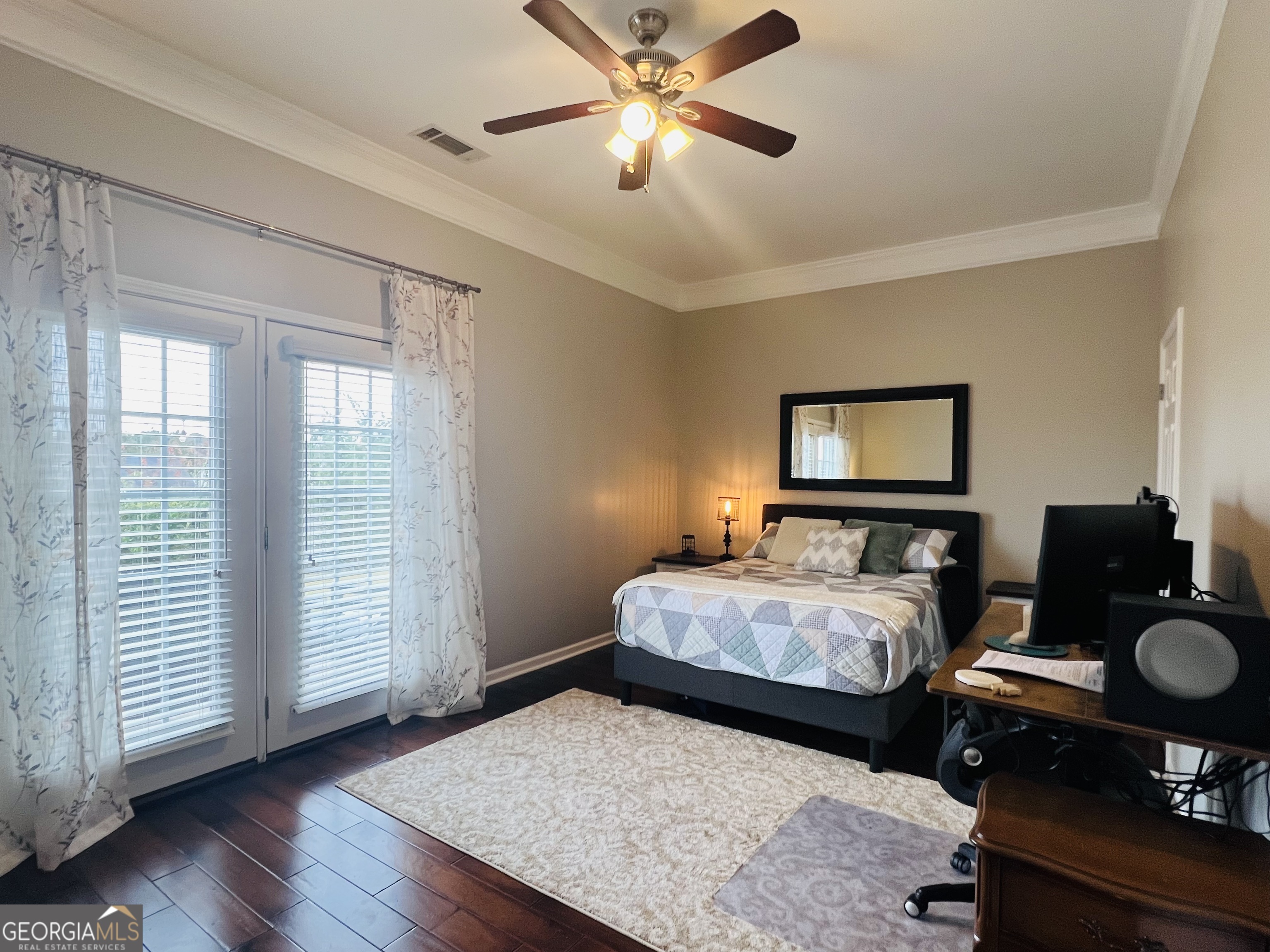 122 Millers Lane Calhoun, GA 30701 - Photo 32 of 60 a bedroom with bed and window