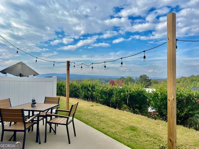 a bedroom with a bed and a desk