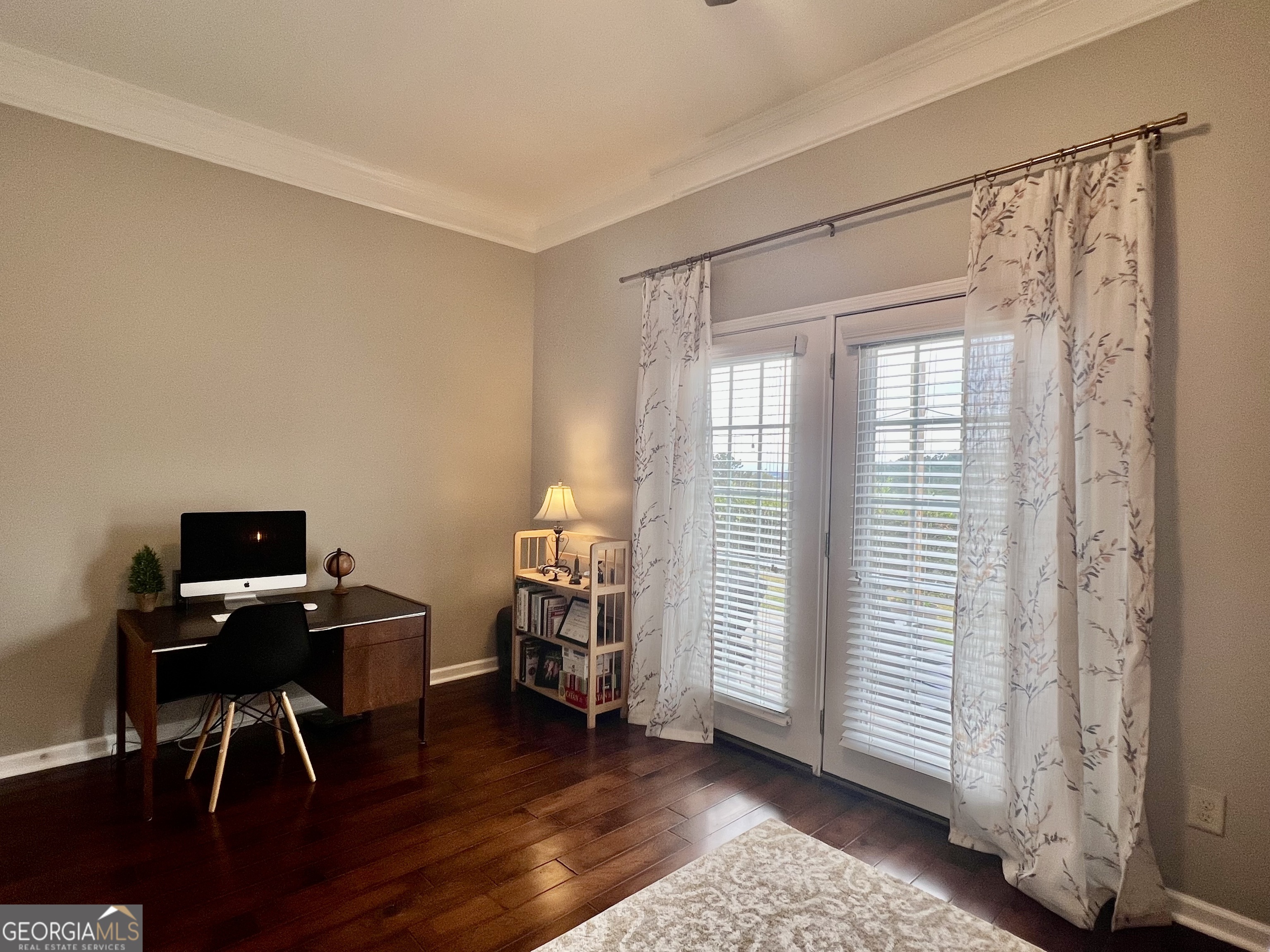 122 Millers Lane Calhoun, GA 30701 - Photo 35 of 60 a view of a workspace with furniture and a window