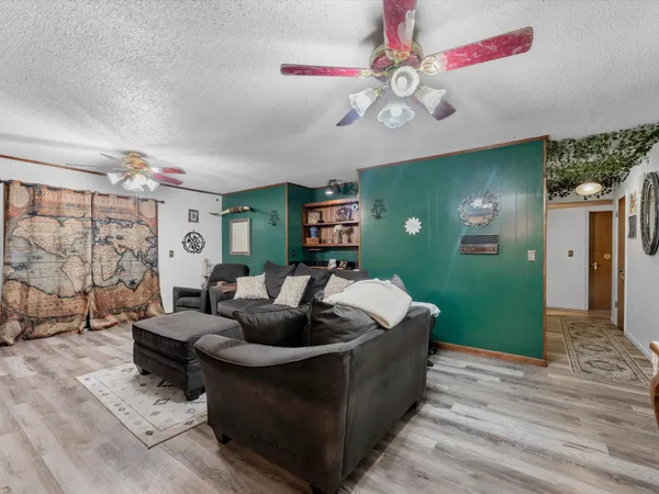 a kitchen with stainless steel appliances granite countertop a sink dishwasher stove and cabinets