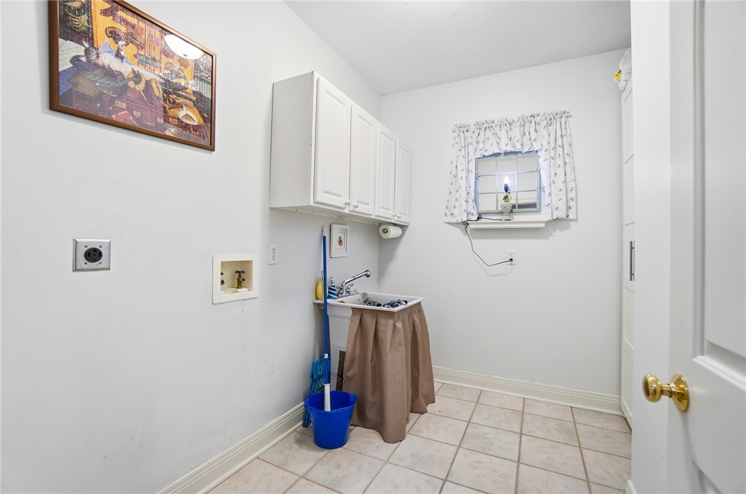 472 Timber Walk Court Springboro, OH 45066 - Photo 50 of 86 This first floor laundry room offers practical solutions for everyday chores.