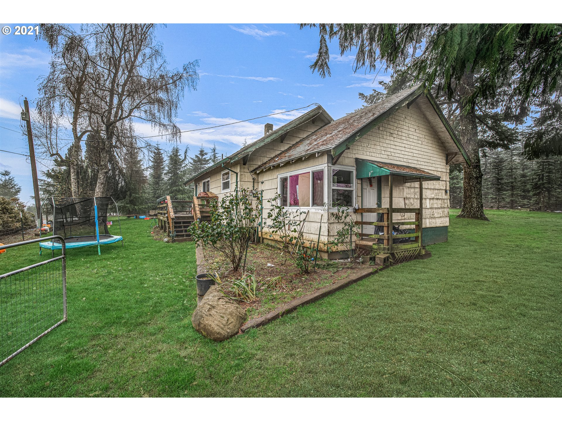 17092 South Carus Road Beavercreek, OR 97004 - Photo 30 of 32 a view of a house with backyard