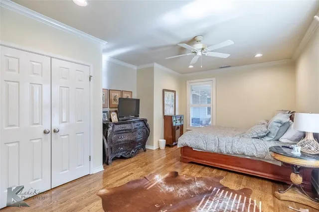 a bedroom with a bed and furniture
