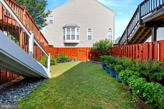 a balcony with lots of green space