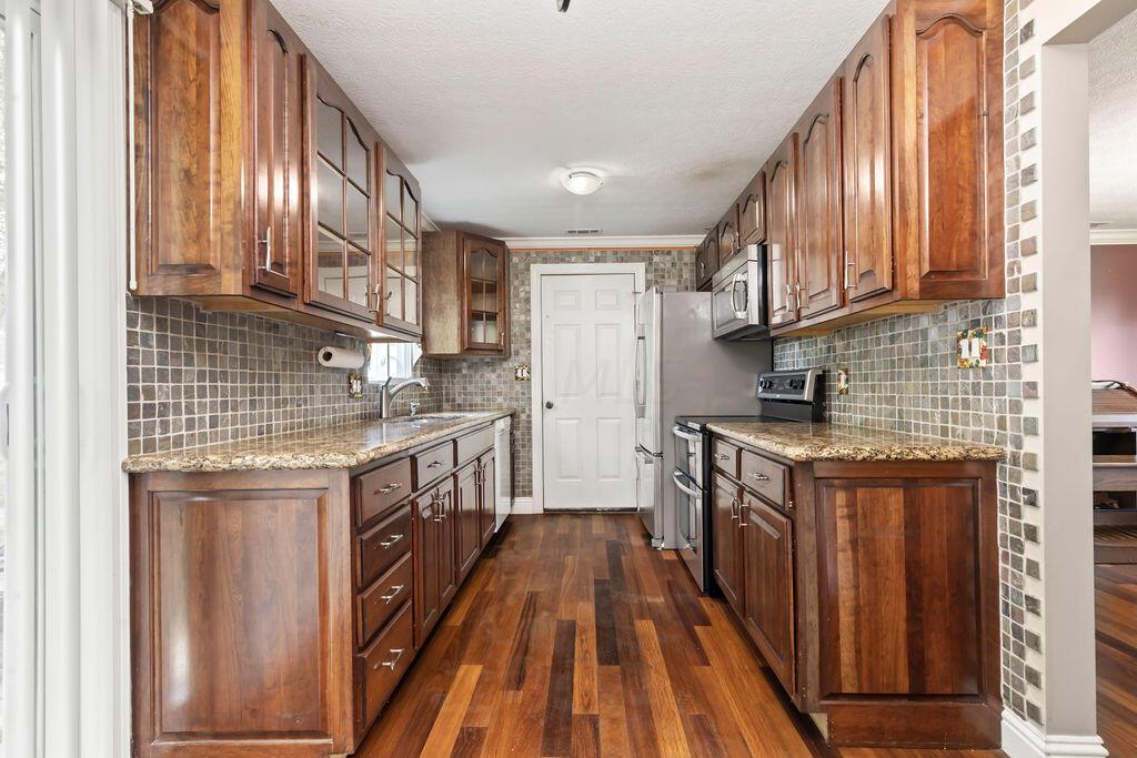 6733 Johnson Road Galloway, OH 43119 - Photo 11 of 44 Door goes out to garage
