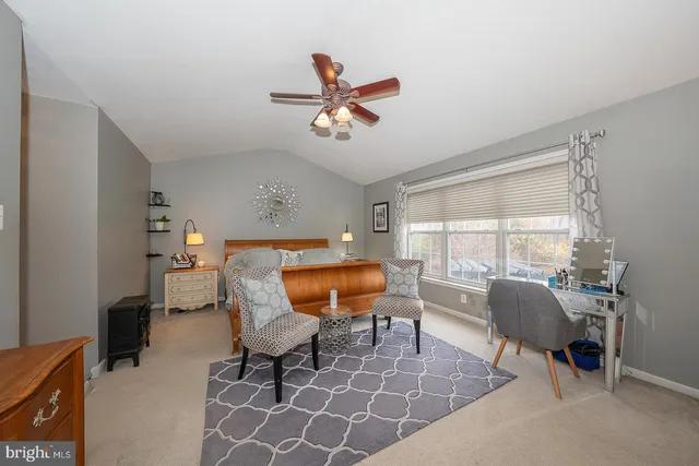 a bathroom with a sink vanity and a mirror