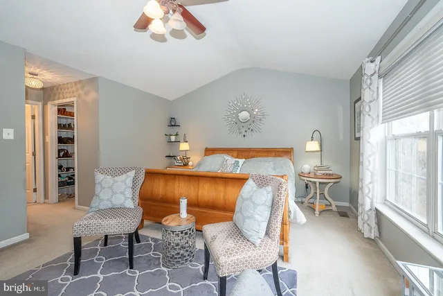 a view of livingroom with furniture and floor to ceiling window
