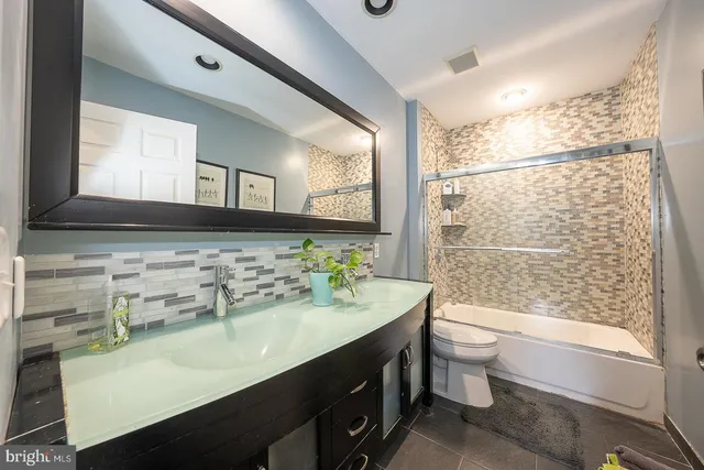 a view of a chairs and table in the patio