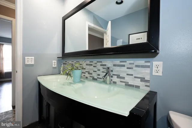 a view of a house with a yard and plants