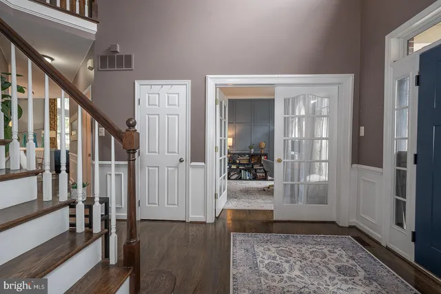 a living room with fireplace furniture and a flat screen tv