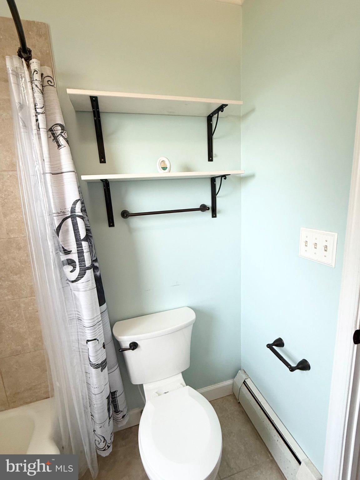 504 Sunset Boulevard Ridgely, MD 21660 - Photo 6 of 29 Chic bathroom with modern shelving.