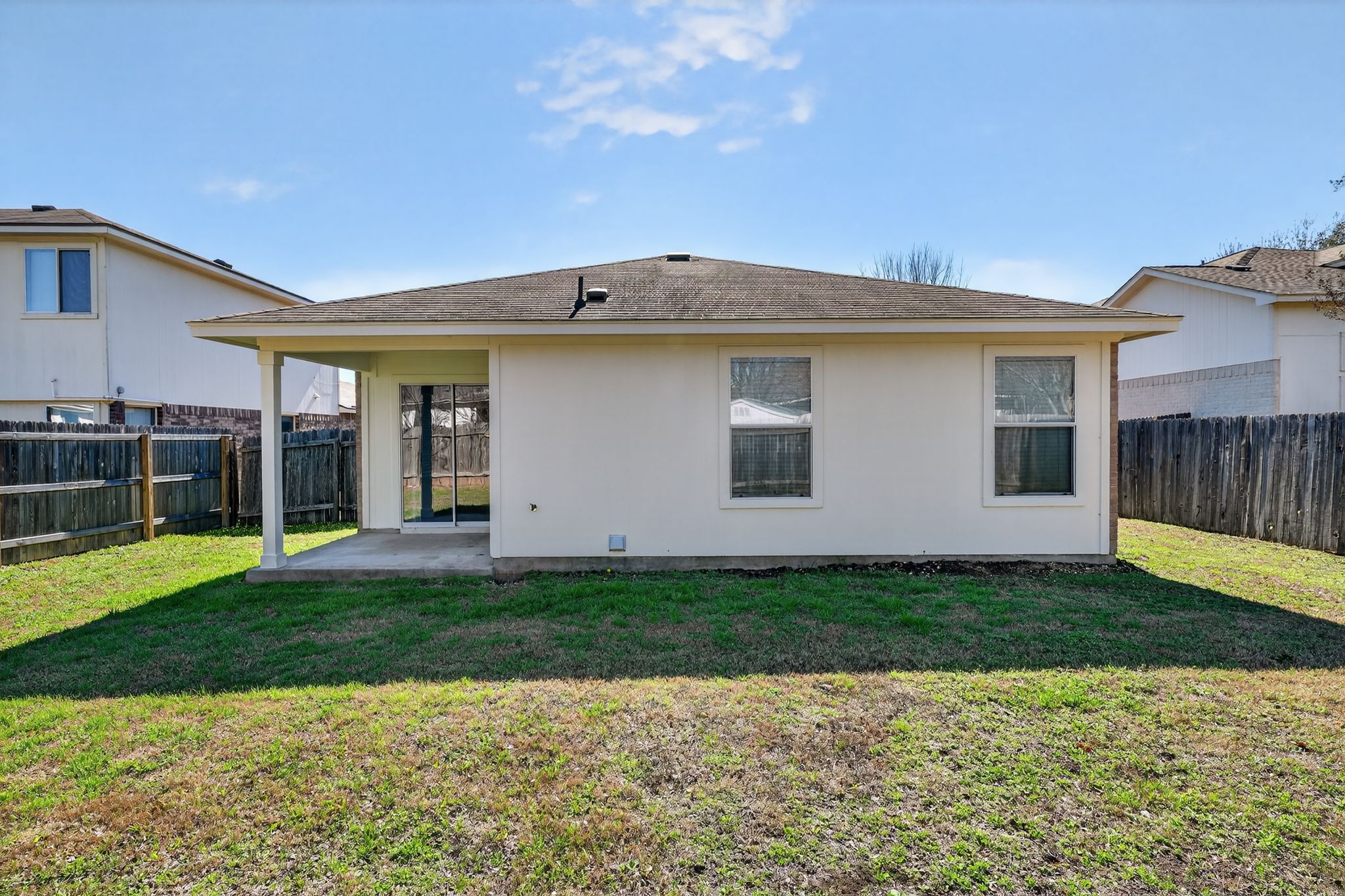 1007 Gentry Drive Leander, TX 78641 - Photo 31 of 35 a view of a house with a yard and a garden