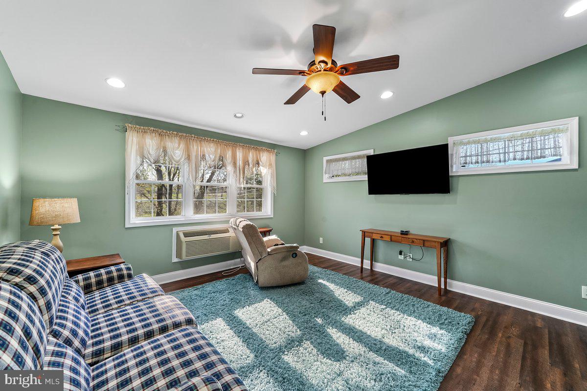 114 Lakeview Drive Ridley Park, PA 19078 - Photo 12 of 37 a bedroom with furniture and a window