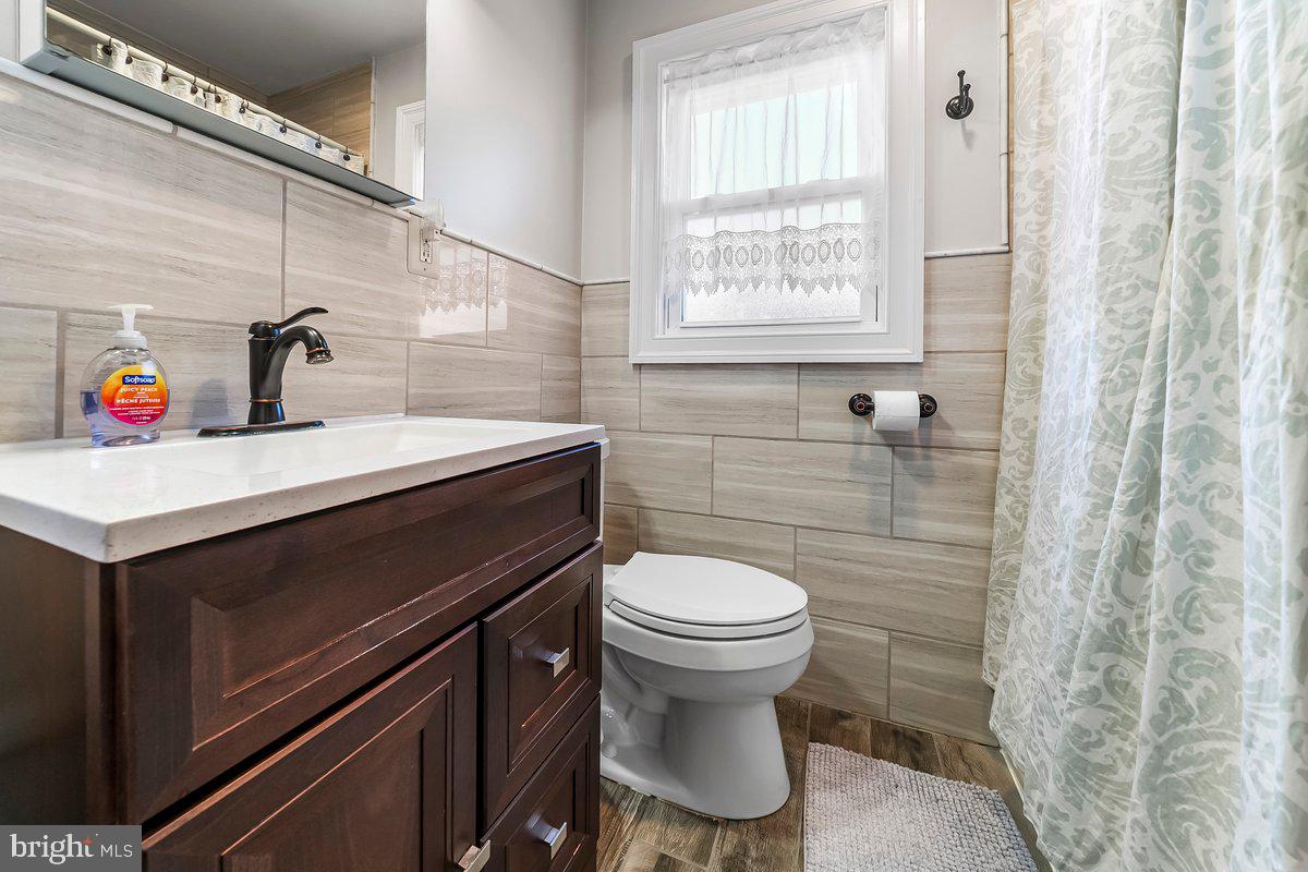 114 Lakeview Drive Ridley Park, PA 19078 - Photo 18 of 37 a bathroom with a sink toilet and shower