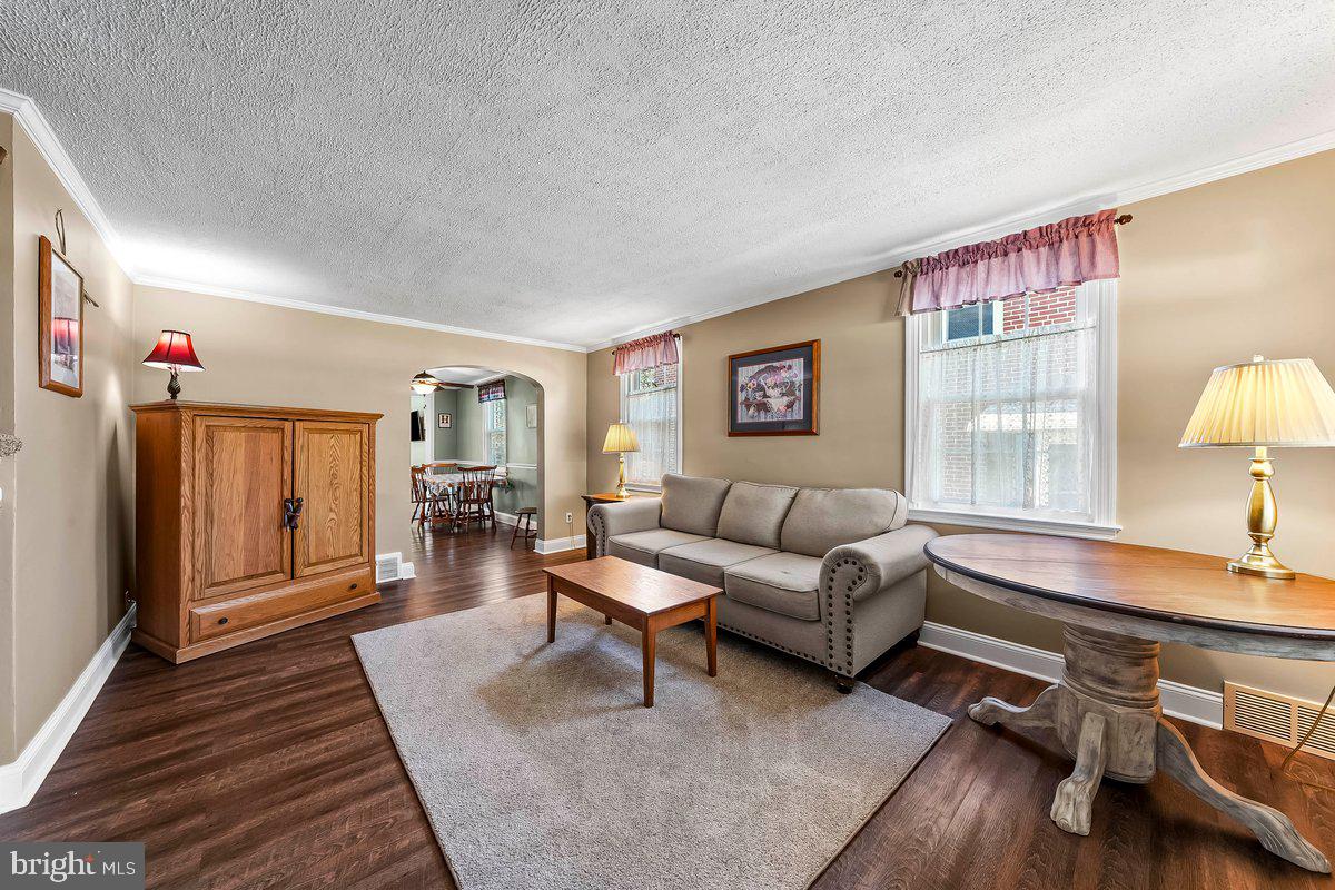 114 Lakeview Drive Ridley Park, PA 19078 - Photo 4 of 37 a living room with furniture and a window