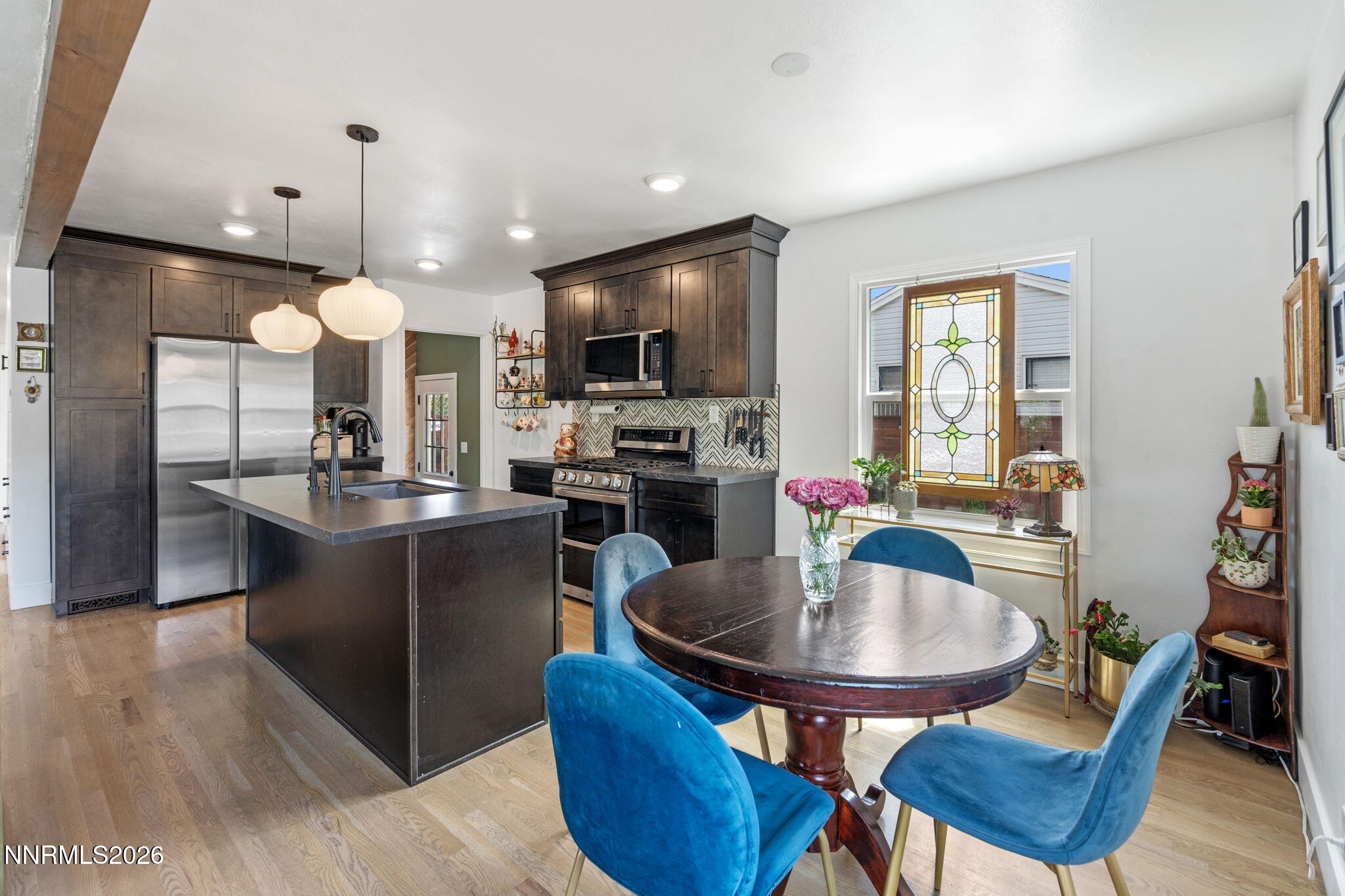 1530 Elmcrest Drive Reno, NV 89503 - Photo 11 of 36 a kitchen with a table and chairs in it