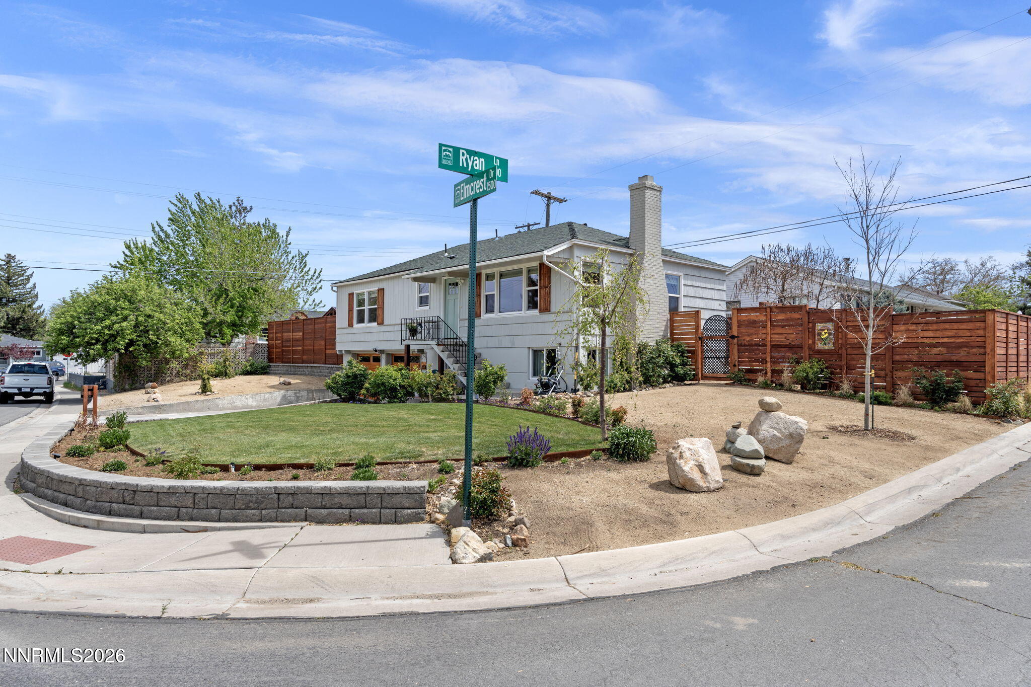 1530 Elmcrest Drive Reno, NV 89503 - Photo 2 of 36 a view of a house with a small yard and a fountain