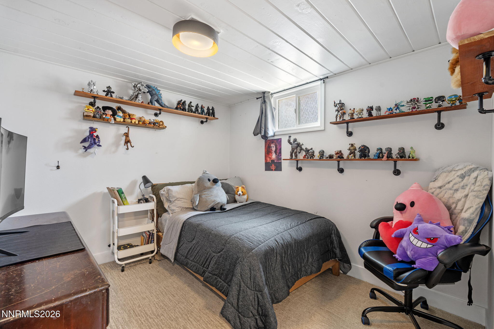 1530 Elmcrest Drive Reno, NV 89503 - Photo 24 of 36 a bedroom with a bed and furniture