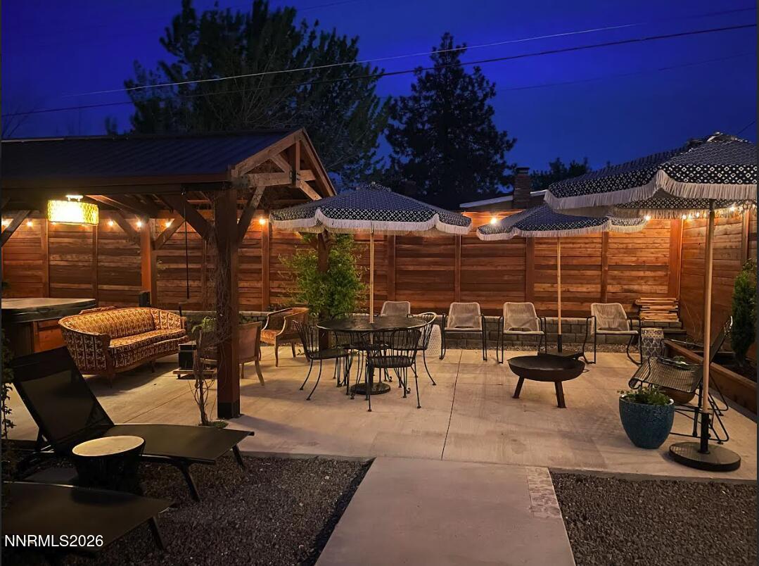 1530 Elmcrest Drive Reno, NV 89503 - Photo 28 of 36 a view of a chairs and tables in patio
