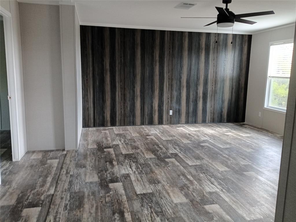 700 Woodhaven Drive Springtown, TX 76082 - Photo 13 of 15 a view of wooden floor