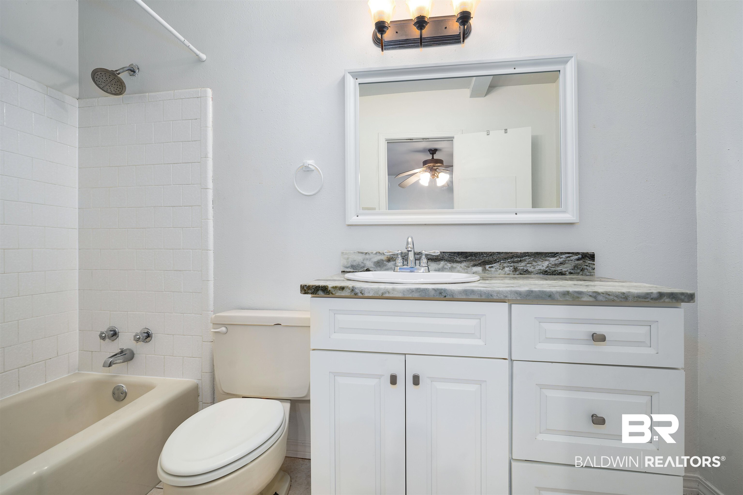 570 Markham Drive Mobile, AL 36609 - Photo 16 of 25 Bathroom with vanity, shower / tub combination, ceiling fan, and toilet