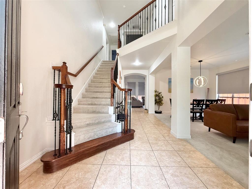 2754 Ridge View Road Frisco, TX 75034 - Photo 5 of 34 a view of a hallway view with staircase