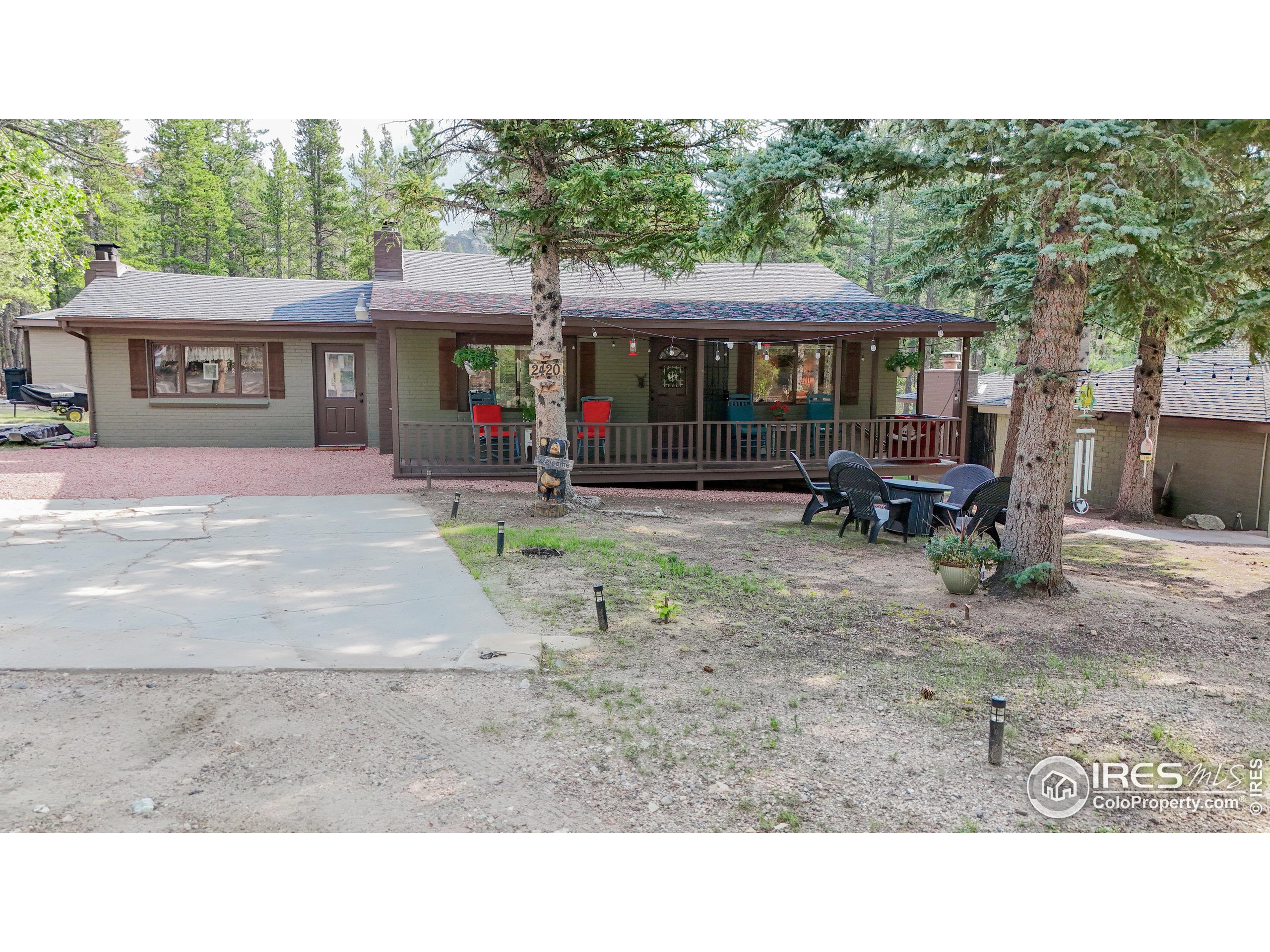 2420 Big Owl Road Allenspark, CO 80510 - Photo 2 of 40 a outdoor space view with a sitting space