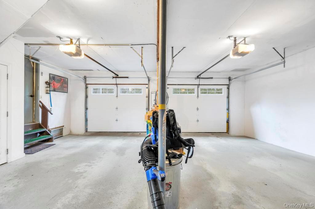 807 Union Avenue Riverhead, NY 11901 - Photo 33 of 41 a view of a room with gym equipment