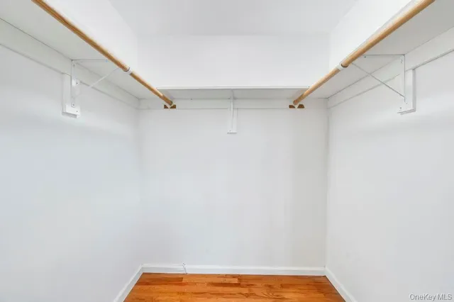 a bathroom with a sink a mirror and shower view