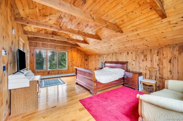 a outdoor space with the couches and dining table view