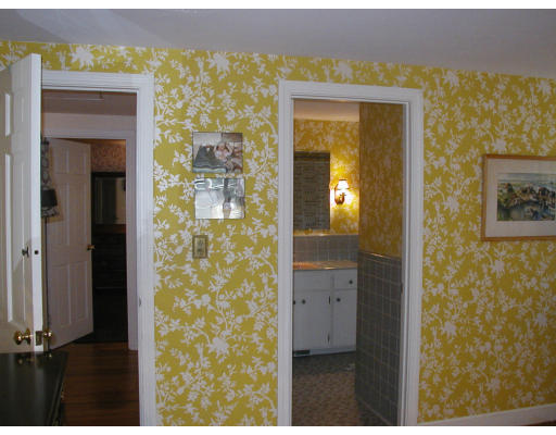 130 Montvale Road Weston, MA 02493 - Photo 15 of 18 a view of a bathroom from a hallway