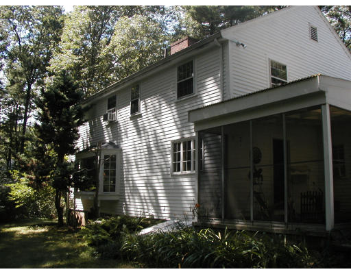 130 Montvale Road Weston, MA 02493 - Photo 3 of 18 a view of a house with a yard