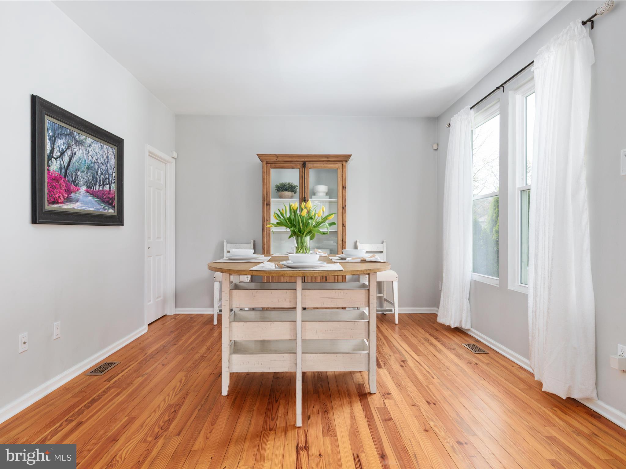 772 3rd Street Herndon, VA 20170 - Photo 14 of 52 a workspace with wooden floor and a window