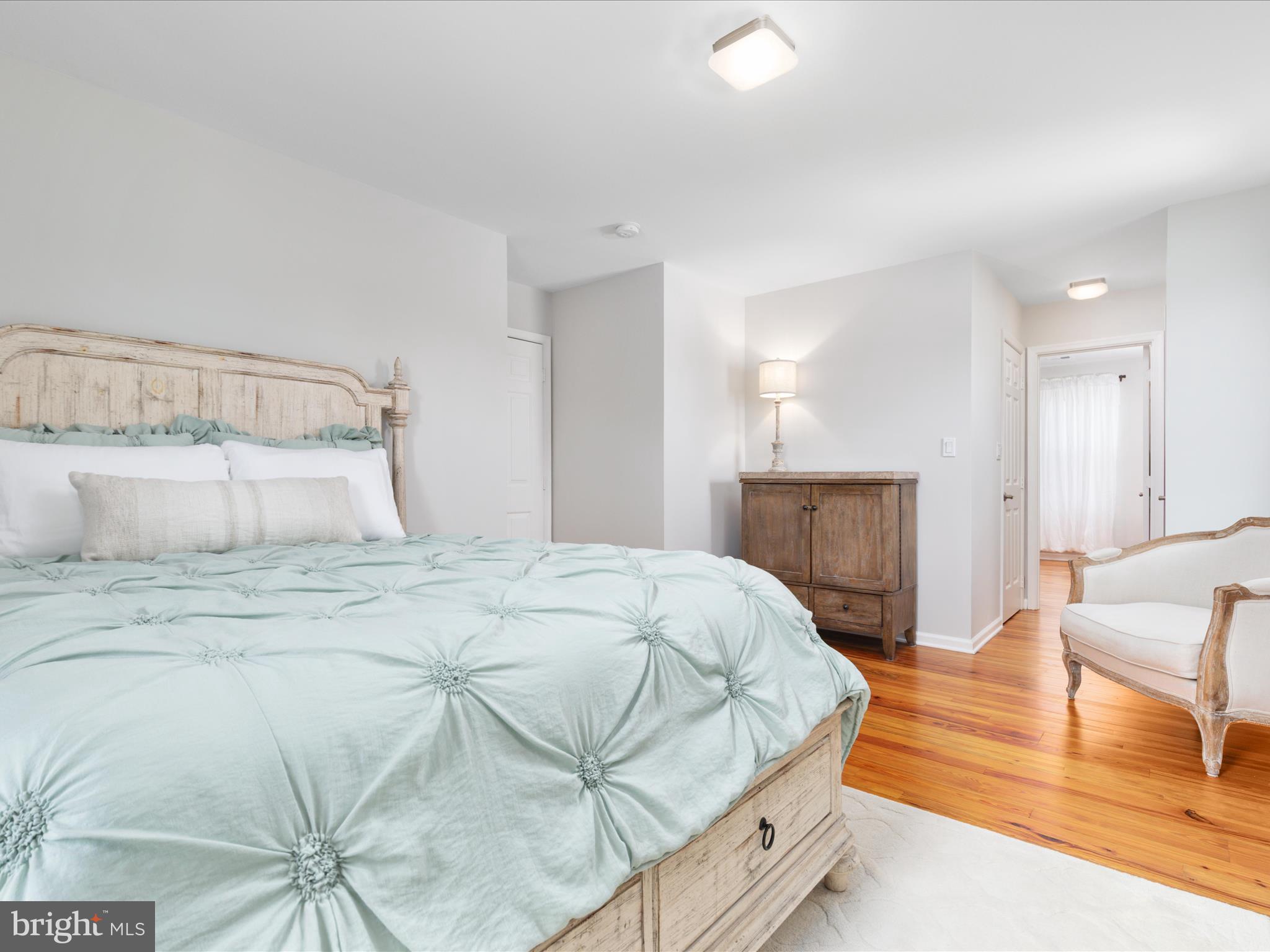 772 3rd Street Herndon, VA 20170 - Photo 18 of 52 a bedroom with a bed and a couch