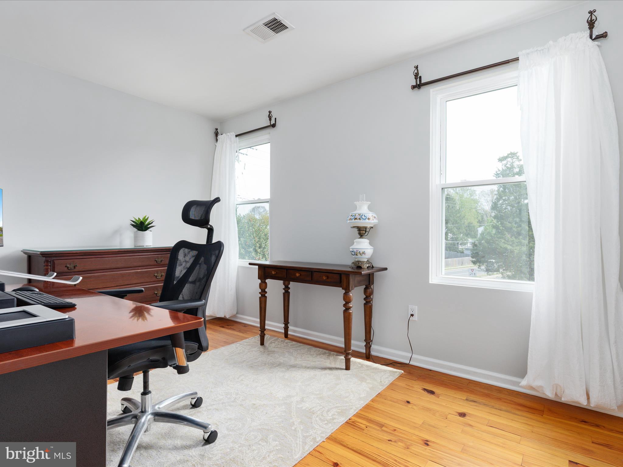 772 3rd Street Herndon, VA 20170 - Photo 24 of 52 a workspace with furniture and a window