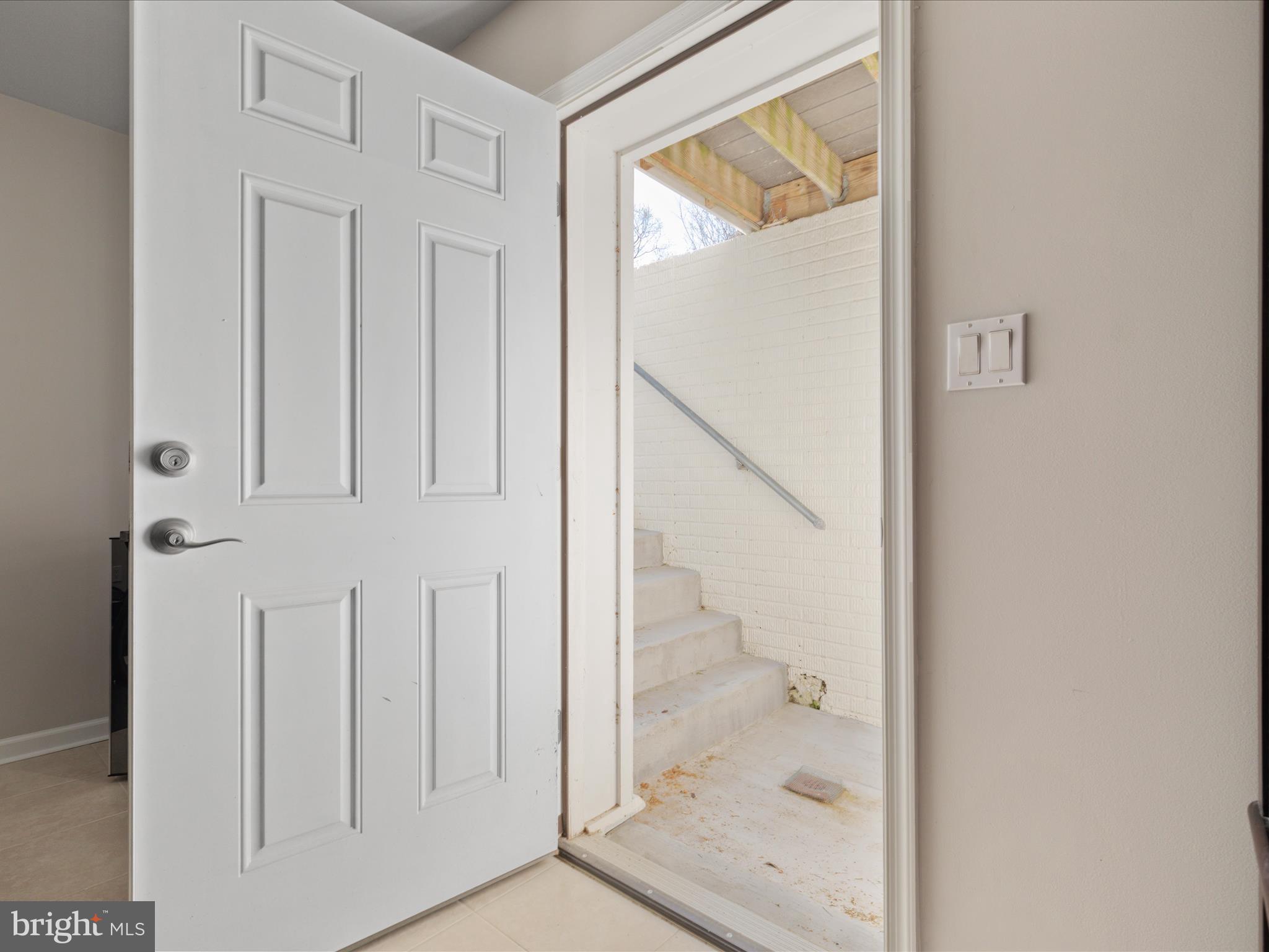 772 3rd Street Herndon, VA 20170 - Photo 31 of 52 a view of a bathroom with a glass door