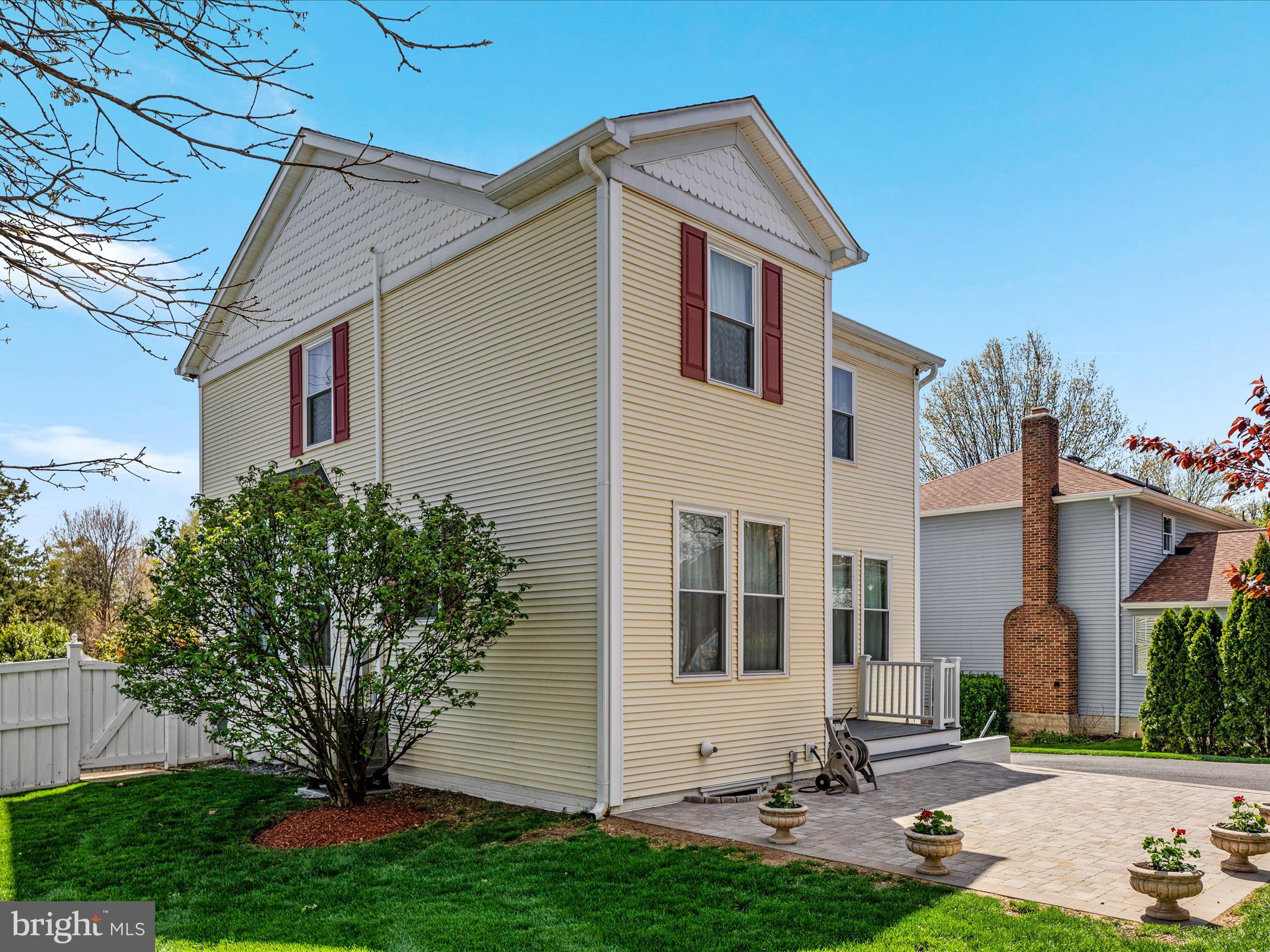 772 3rd Street Herndon, VA 20170 - Photo 32 of 52 a front view of a house with a yard