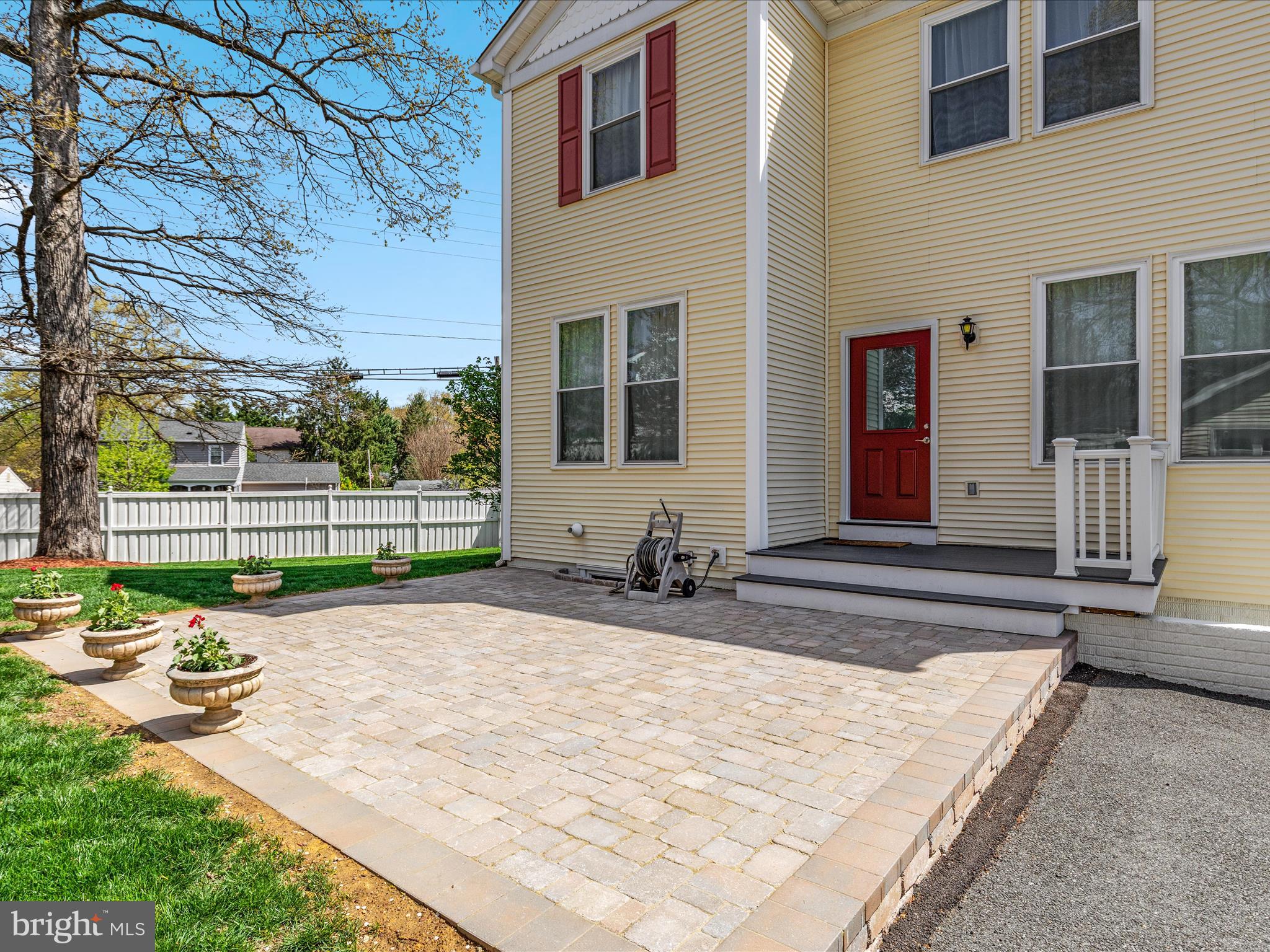 772 3rd Street Herndon, VA 20170 - Photo 34 of 52 a view of backyard with wooden fence and large trees