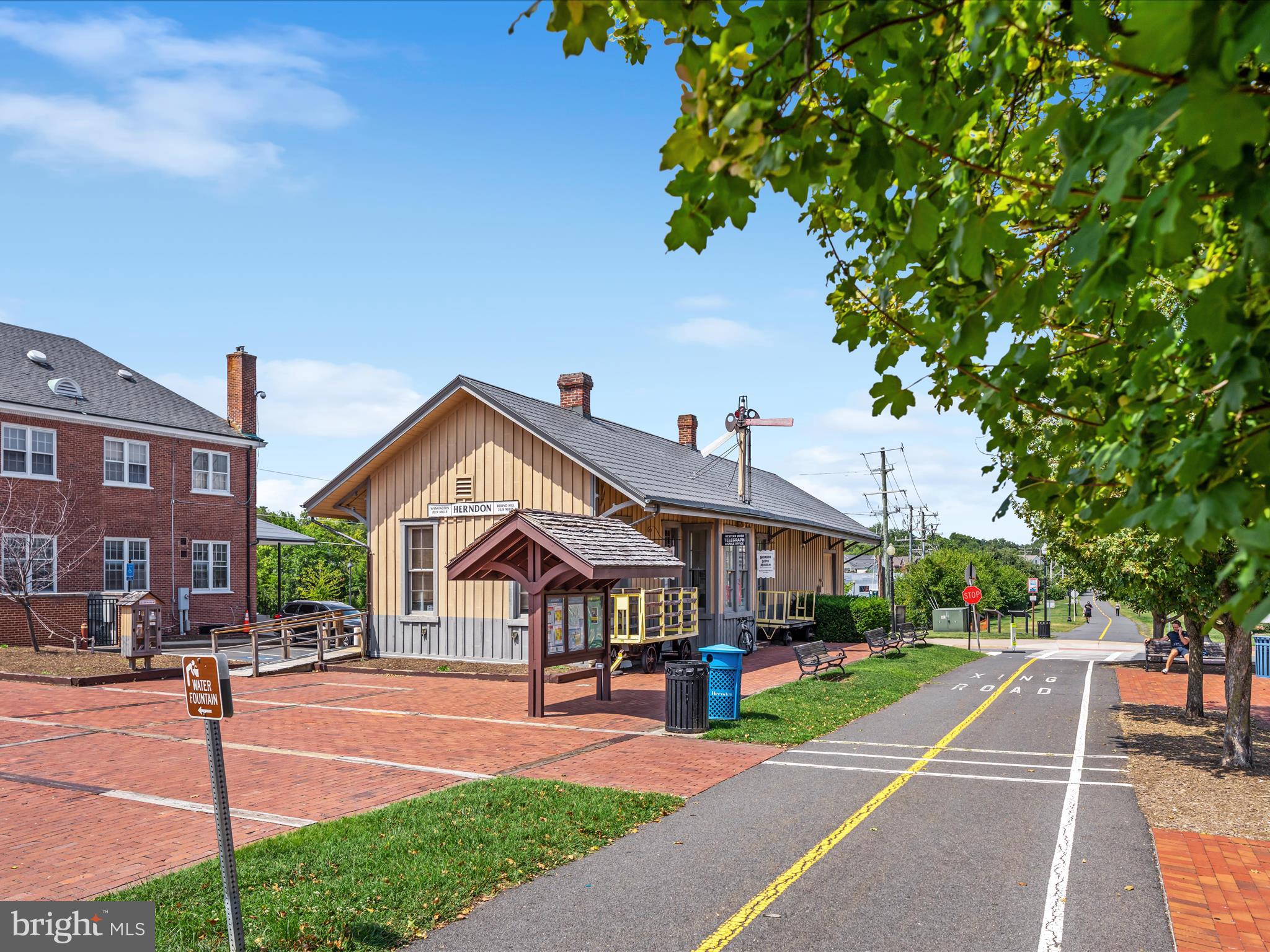 772 3rd Street Herndon, VA 20170 - Photo 46 of 52 a front view of a building with parked space