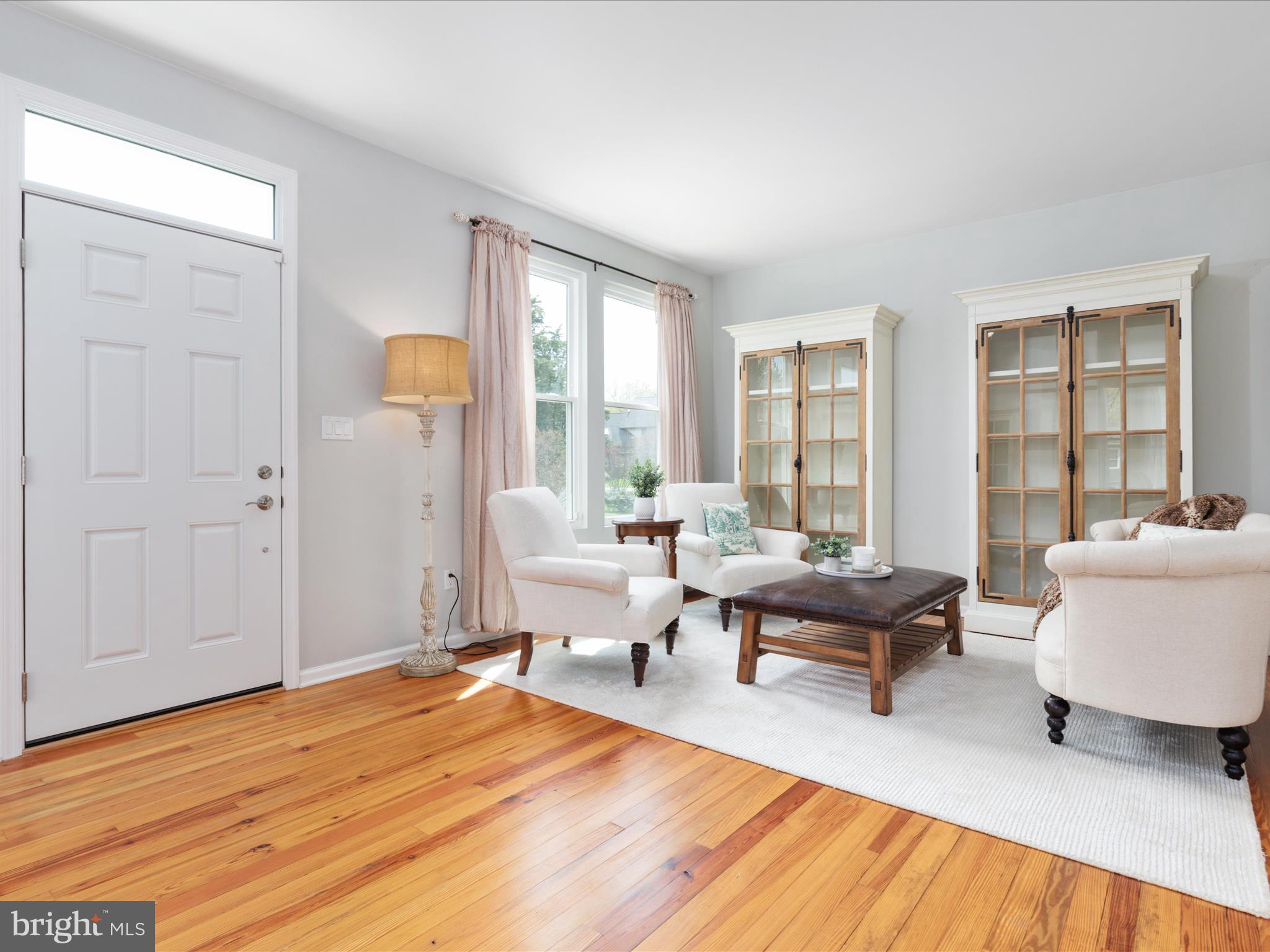 772 3rd Street Herndon, VA 20170 - Photo 5 of 52 a living room with furniture and a wooden floor