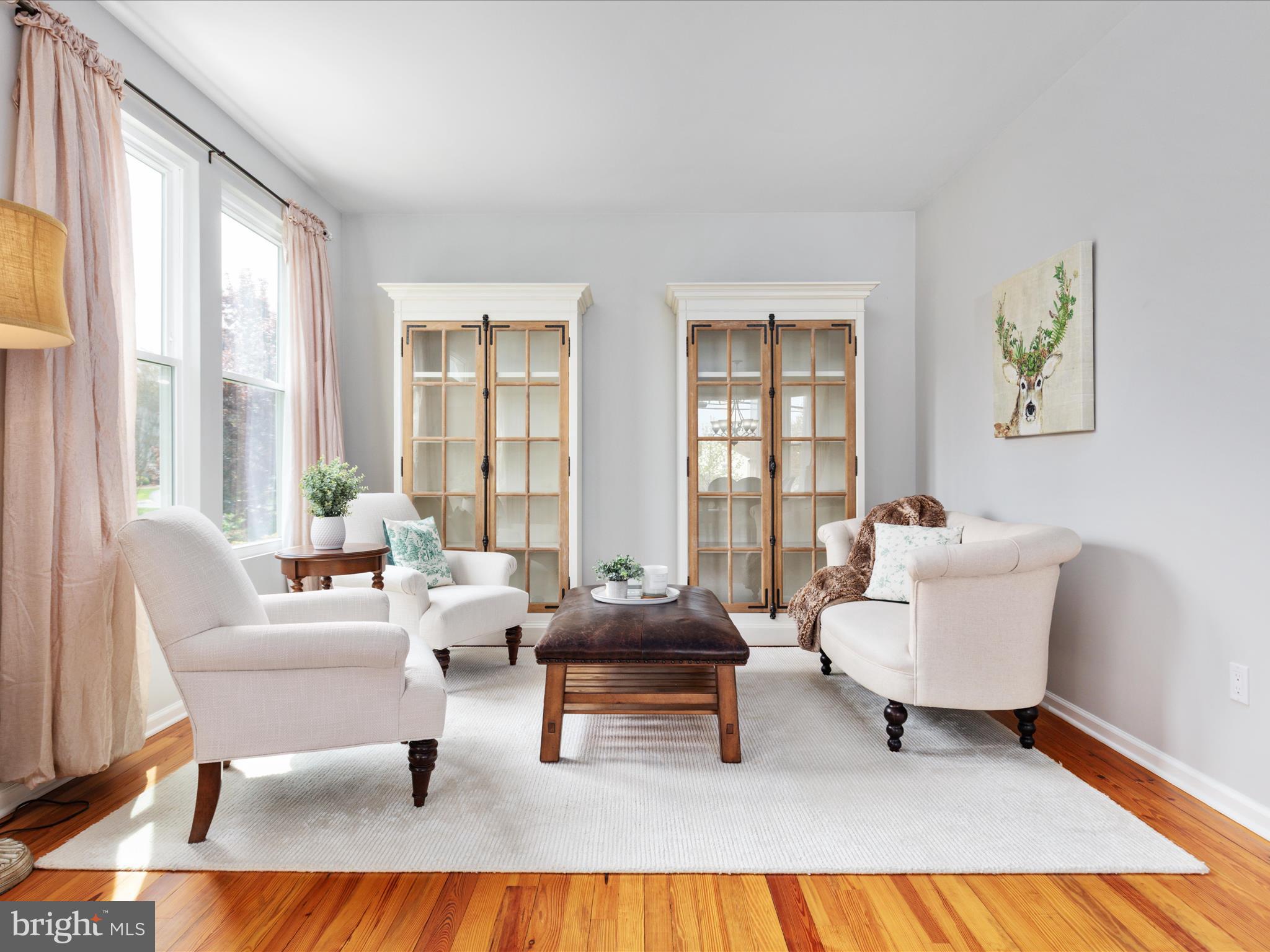 772 3rd Street Herndon, VA 20170 - Photo 6 of 52 a living room with furniture and a large window