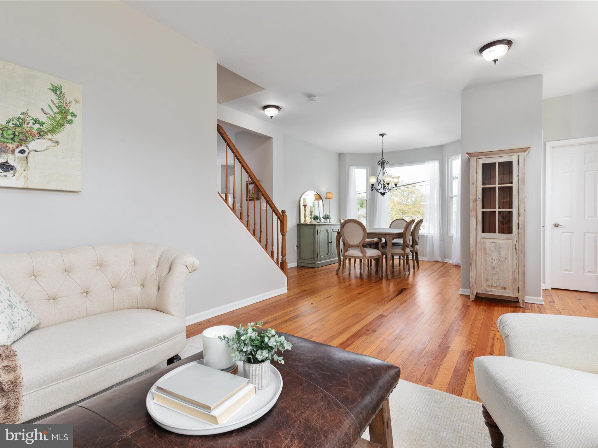 772 3rd Street Herndon, VA 20170 - Photo 7 of 52 a living room with furniture and wooden floor
