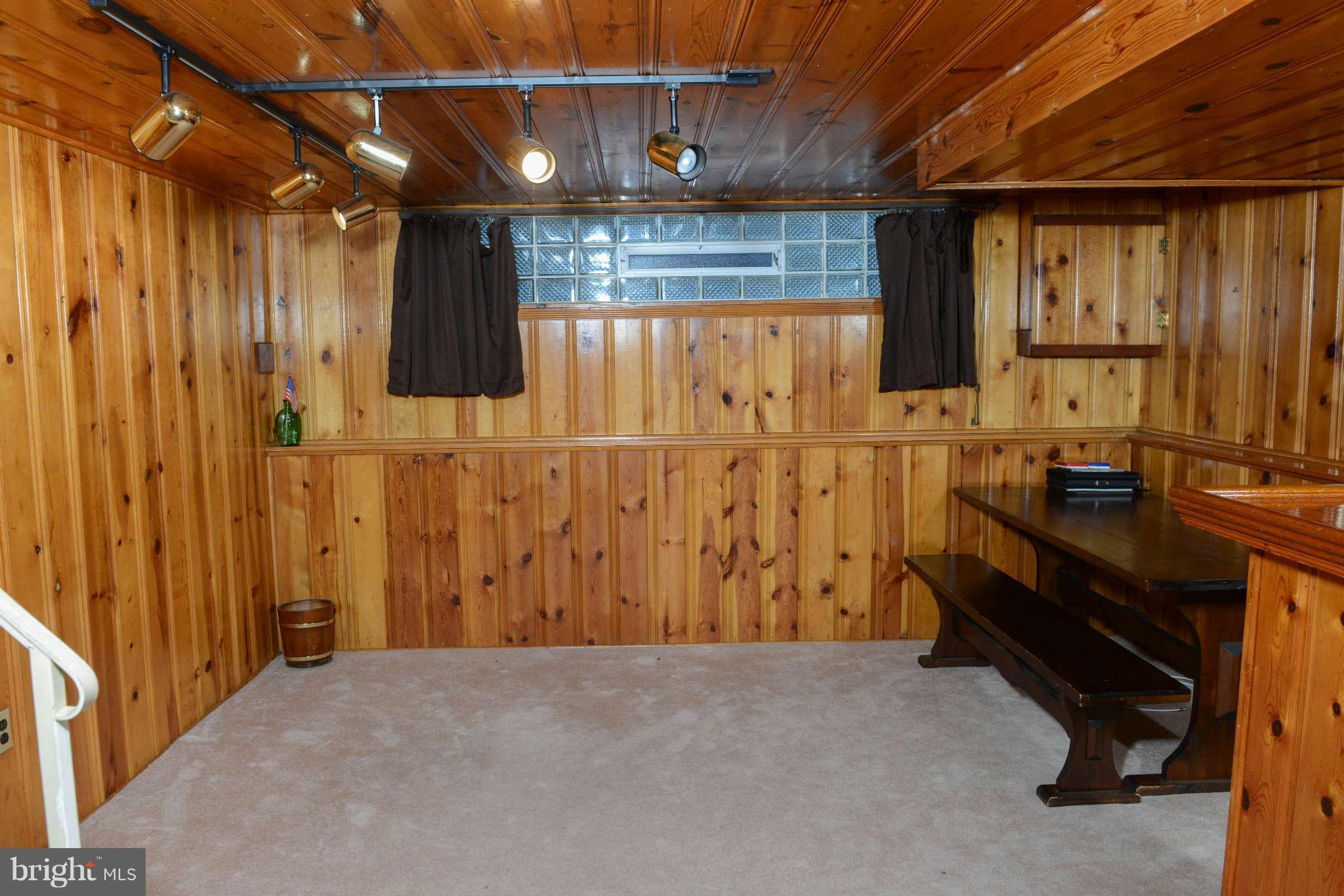 1208 St Andrews Way Baltimore, MD 21239 - Photo 14 of 20 Family Room - Lower Level - Classic Knotty Pine