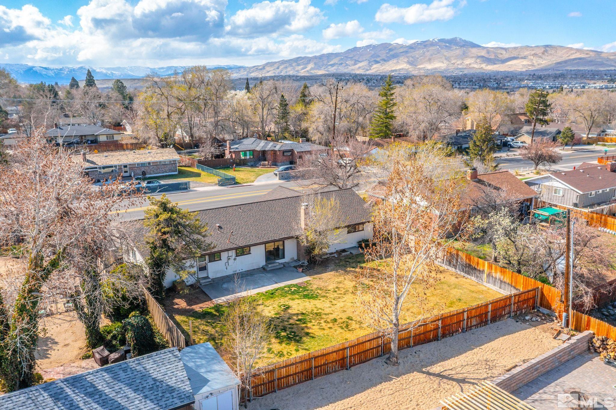 1680 Hunter Lake Drive Reno, NV 89509 - Photo 22 of 26 a view of swimming pool with outdoor seating