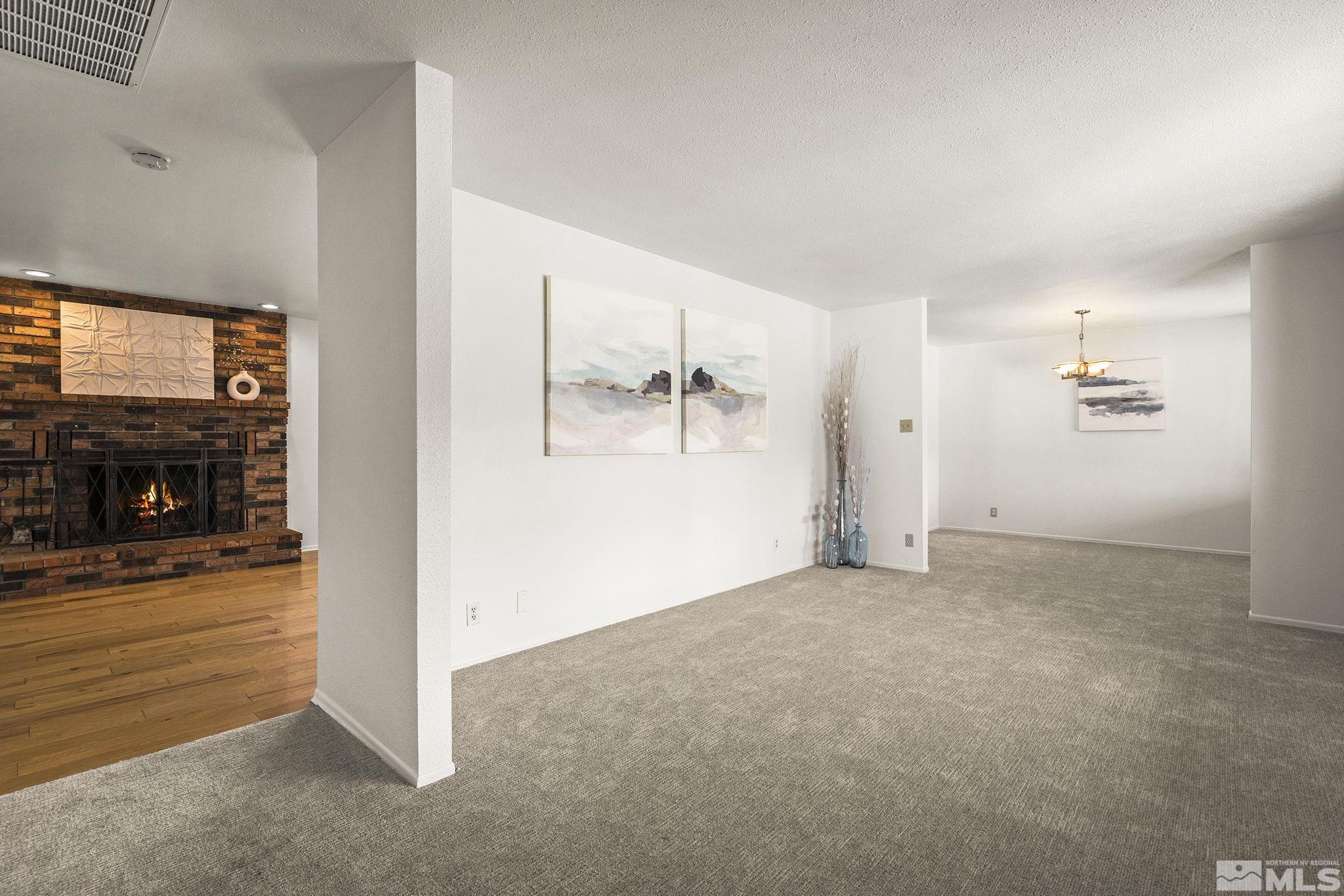 1680 Hunter Lake Drive Reno, NV 89509 - Photo 8 of 26 an empty room with windows