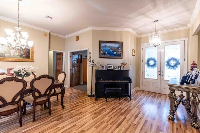 a bath tub sitting in a bathroom next to a window