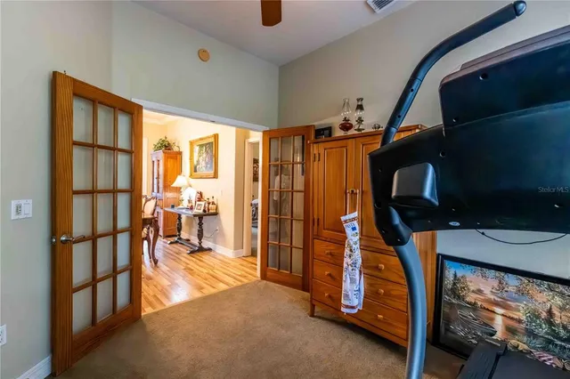 a view of a living room and dining room
