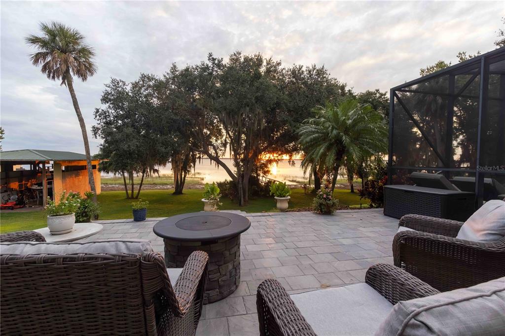2329 South Lake Reedy Boulevard Frostproof, FL 33843 - Photo 4 of 86 a view of a backyard with sitting area and furniture