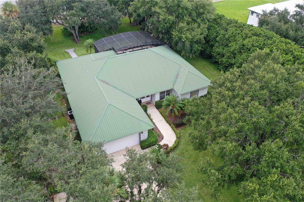 2329 South Lake Reedy Boulevard Frostproof, FL 33843 - Photo 6 of 86 an aerial view of a house with a yard and lake view