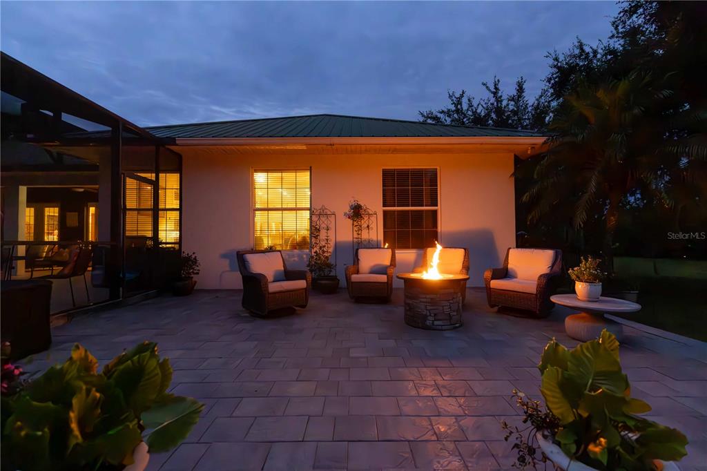 2329 South Lake Reedy Boulevard Frostproof, FL 33843 - Photo 61 of 86 a living room with furniture potted plants and a large tree